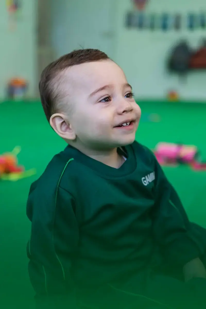 Bebê do Berçário Gammon sorrindo